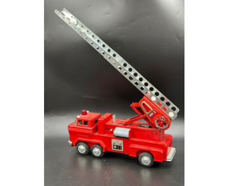 Tin plate toys to include Y-3 Firetruck, Codeg toy till, Codeg telephone exchange Tri-ang KL44 crane and a Marx TWA airplane.