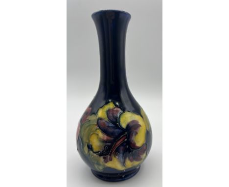 A Moorcroft Hibiscus pattern vase with paper label to base, By Appointment W. Moorcroft Potters to the late Queen Mary.  16cm