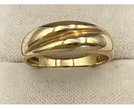 A 9 carat gold ring, size O/P. Weight 3.2gm. 