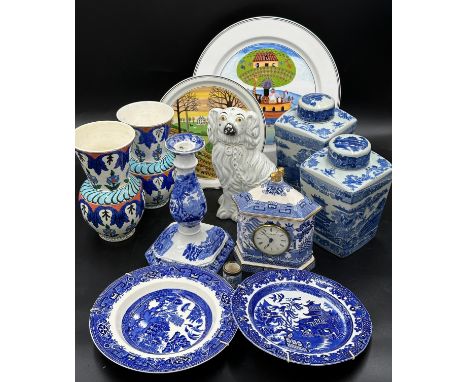 A mixed collection of ceramics to include: a 19thC Staffordshire dog, blue and white plates x 2, a candlestick 23cm h and a s