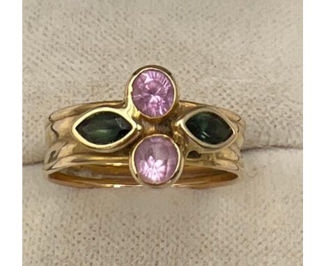 A 14 carat gold gem set ring. Size P. Weight 2gm. 