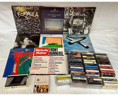 A music collection comprising 50 Cassettes (mainly Indie, Rock and Alternative interest), 8 vinyl records and a vintage perso