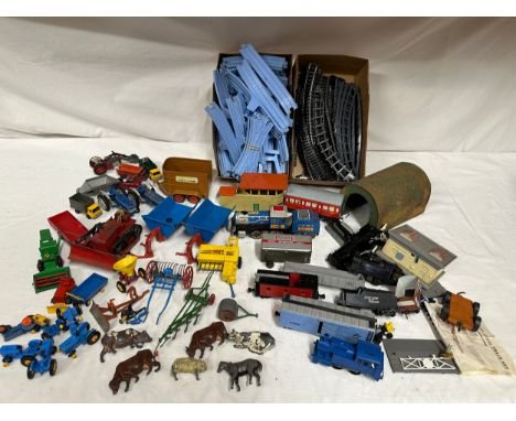 A collection of vintage diecast/plastic farming models to include Britains 2 x Ford Super Major tractors, a 4 furrow plough, 