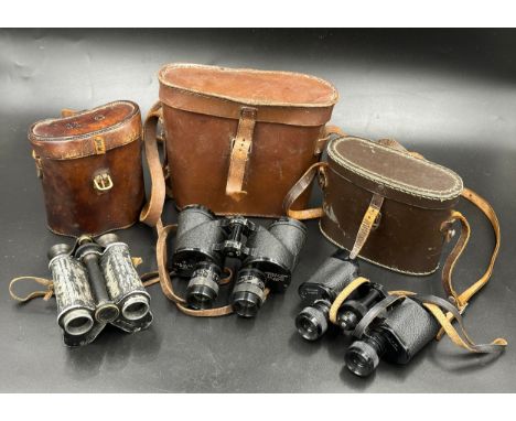 Three sets of binoculars to include a pair of military 1944 WW2 Graticule Apart R E L Canada, Lieberman &amp; Gortz 8x26  tog