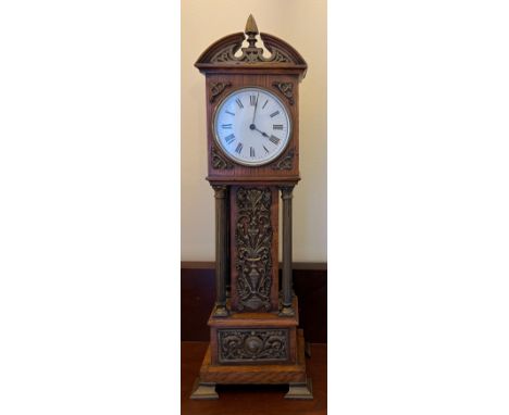 An oak and brass mounted miniature long case clock 46cm h. Works marked R &amp; Co. Paris. 