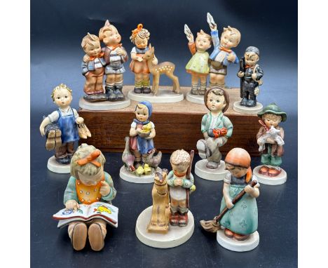 A quantity of Goebel Hummel figures, to include 8 Bookworm, 20 Prayer Before Battle, 123 Max and Moritz, 136 Friends, 143 Boo