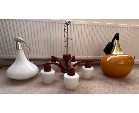 Mid 20thC lighting to include five branch teak chandelier, rise and fall orange hanging light and a white glass pendant light