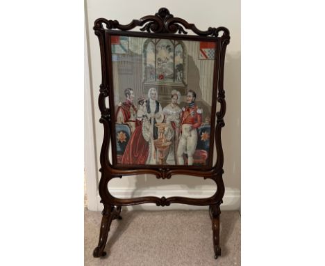 A fine quality rosewood firescreen with wool and beadwork embroidery depicting the christening of Victoria, the Princess Roya