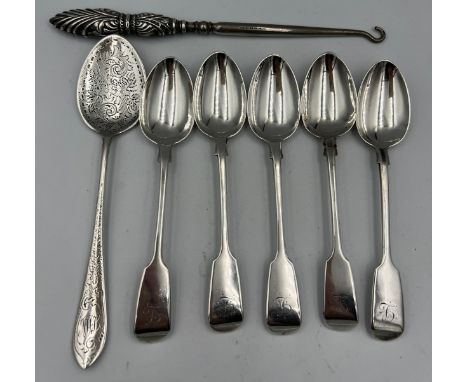 Silver to include five teaspoons, London 1856, a silver handled button hook and preserve spoon, Sheffield 1895. Weighable sil