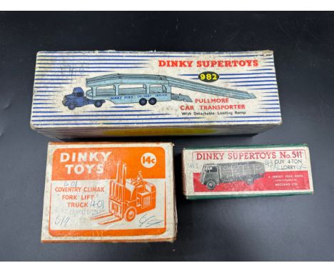 Boxed Dinky toys to include 982 Pullmore Car Transporter, 14c 401 Coventry Climax Fork Lift Truck and a 511 Guy 4-Ton Lorry. 