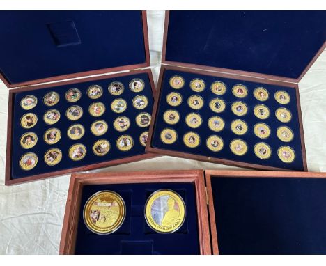 Two boxed sets of gold plated commemorative coins, 24 in each box, Princess Diana and Queen Elizabeth II. Princess Diana each