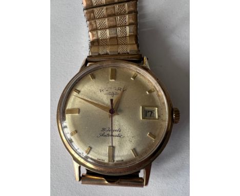 A 9ct gold Rotary Automatic gentleman's wristwatch with date aperture, 21 jewels. Excalibur rolled gold expanding bracelet.  