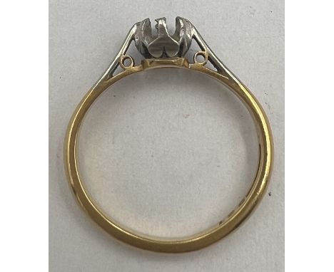 A 18 carat gold and platinum ring lacking stone. Size I, Weight 2.6gm. 