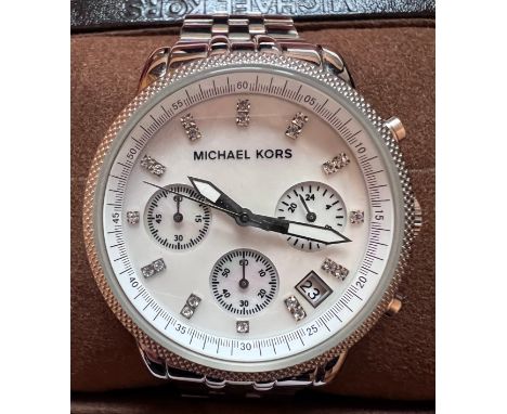 A Michael Kors ladies wristwatch MK-5020 quartz wristwatch. Original box and instruction manual. 