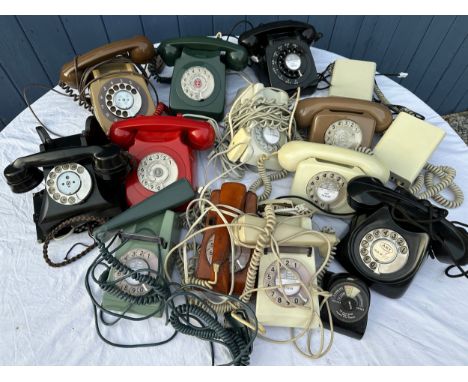 A large quantity of various vintage and model telephones to include  P.O., G.P.O. timer, a Smiths  etc. 