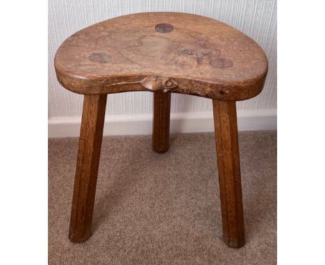 A Robert ‘Mouseman’ Thompson three legged milking stool. Believed to have been purchased by the vendor’s family in the 1960’s