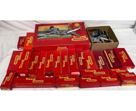 A large quantity of Tri-ang railway Locomotives, Wagons and accessories to include R3 Electric Goods Train, R.214 Ore Wagon, 