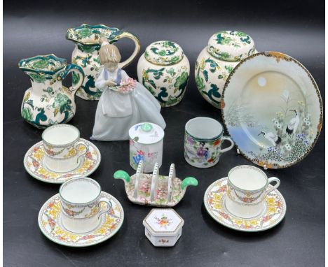 An assortment of ceramics to include a Shelley lidded pot and a small toast rack "Maytime", Nao figurine, "My Bouquet", girl 