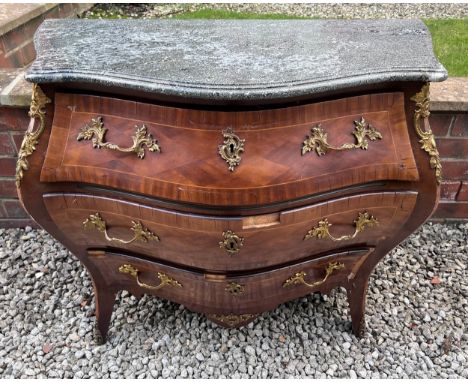 A continental parquetry inlaid bombe fronted commode of three drawers with ormolu mounts and marble top. 100 w x 57 d x 80cm 