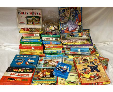 A large collection of vintage jigsaws to include Dolls House, Noddy, Tom &amp; Jerry, Rupert, Little Noddy Big Piece jigsaw, 