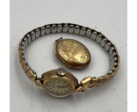 A 9 carat gold cased ladies Rotary wristwatch on a rolled gold elasticated strap together with a locket with 9 carat gold fro