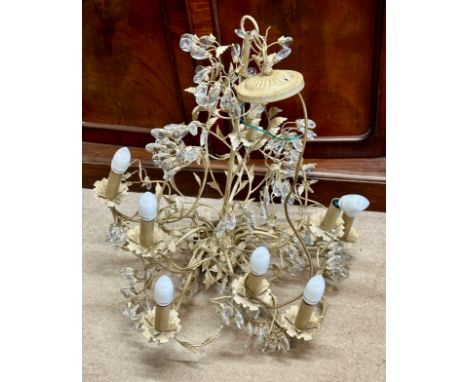Three 20thC painted metal shabby chic French style centre light fittings measuring approx. 78cm h each with eight lights. 