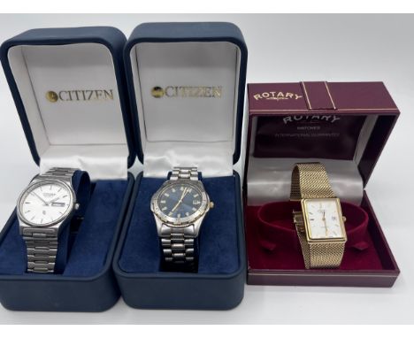 Three boxed gentlemen's wristwatches to include Citizen Quartz with red date aperture, Citizen Eco-Drive WR 100 and a gold pl