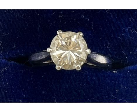 An 18 carat white gold ring set with solitaire diamond, Size I/J, weight 2.4gm. Approximate diamond weight 1 carat. 