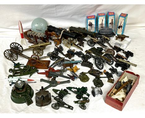 An assortment of miniature canons and military accessories  to include Britains, Dinky, Depose and Lone Star together with a 