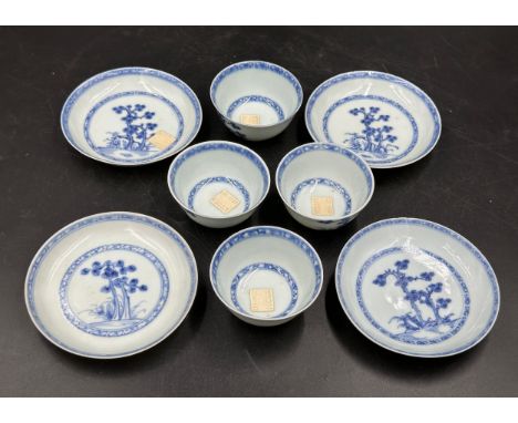 Four Chinese Nanking Cargo blue and white tea bowls and saucers painted with Blue Pine pattern. All with Christies label to b