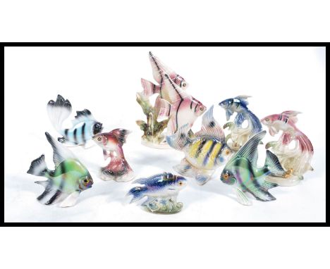 A collection of nine vintage retro 20th Century ceramic lustreware models of tropical fish figures by Jema (Holland),&nbsp; i