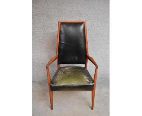 A 1960's vintage Danish teak and leather upholstered high back armchair. H.112x60cm 