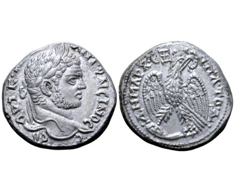 Caracalla AR Tetradrachm of Antioch, Seleucis and Pieria. Dated RY 4 = AD 214/5. ????•M•A• ANT??????C C?B, laureate head righ