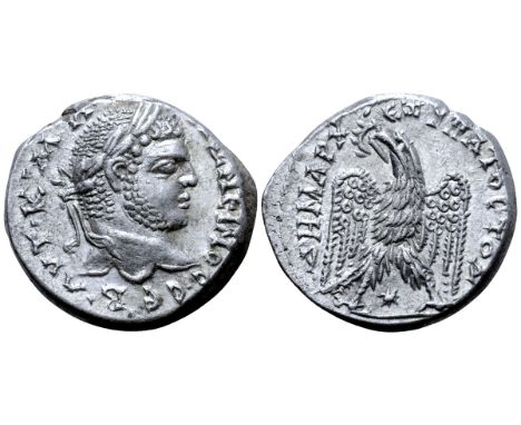 Caracalla AR Tetradrachm of Laodicea ad Mare, Seleucis and Pieria. AD 215-217. AYT•K•M•A• ANT?N?INOC• C?B, laureate head righ