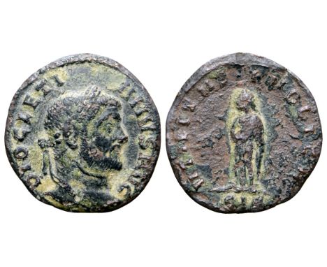 Diocletian Æ Quinarius. Siscia, AD 294-295. DIOCLETIANVS AVG, laureate head right / VTILITAS PVBLICA, Utilitas standing facin