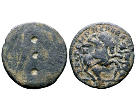 Roman Gaming Token(?), cut from a Constantius II Æ Centenionalis. Rome, struck circa AD 348-350. Three engraved holes in near