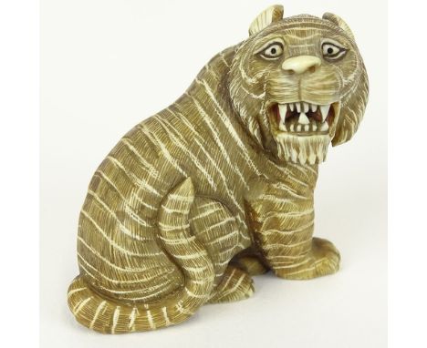 19th Century Japanese Carved Netsuke Depicting a Tiger. Signed with artist's signature Gyoku Shi (1801-1868). Good condition.