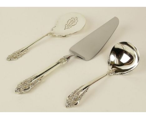 Lot of 3 Wallace Grande Baroque sterling silver serving pieces. This lot includes: tomato server; ladle; cake/pie server (hol