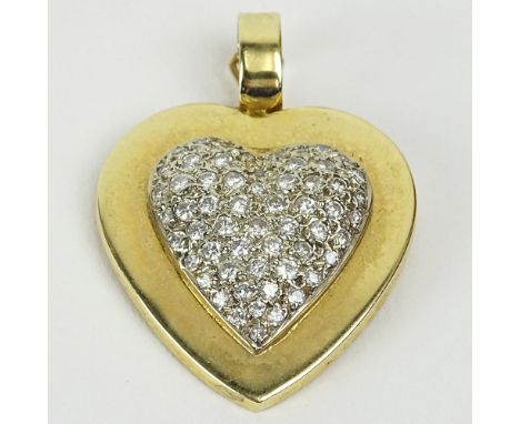 Lady's Vintage Pave Set Diamond and 14 Karat Yellow Gold Heart Pendant. Diamonds. H-I color, SI clarity. Unsigned. Good condi