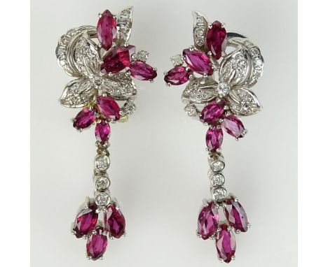 Lady's Vintage Approx. 2.5 Carat Marquise Cut Ruby, .60 Carat Diamond and 14 Karat White Gold Earrings. Signed AV 585. Rubies