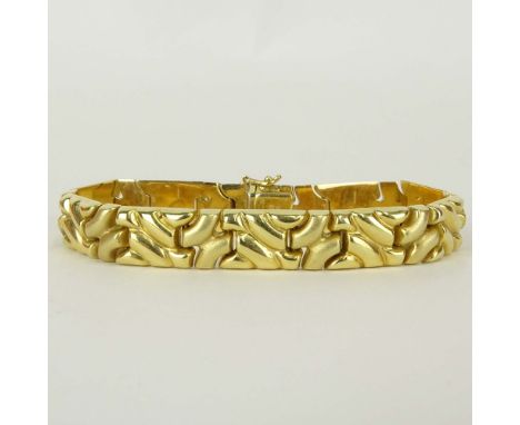 Vintage Modern Design 14 Karat Yellow Gold Bracelet. Signed. Good condition. Measures 7 inches long and 3/8 inch wide. Approx