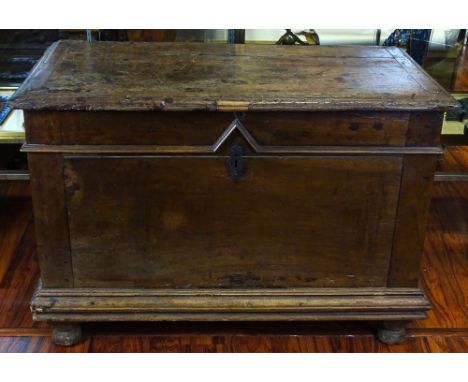 Large 17th Century Continental Walnut Trunk with hand forged iron hardware. Unsigned. Good antique condition with losses, spl