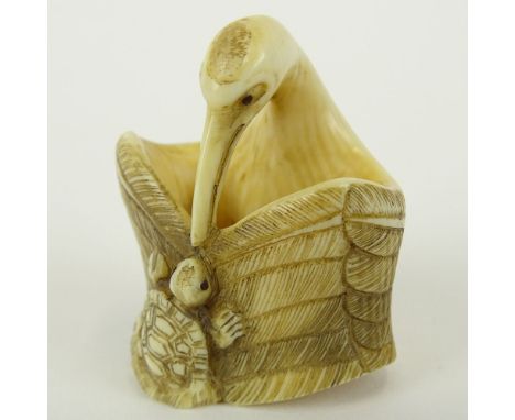Early 20th Century Japanese Baisho Shop Carved Netsuke In The Form of a Stork and Turtle. Finely Incised. Signed with artist'