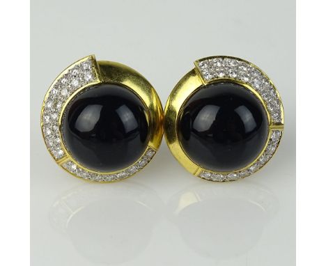Lady's Vintage Approx. 2.0 Carat Round Cut Diamond, 18 Karat Yellow Gold and Onyx Button Ear Clips. Diamonds F-G color, VS cl