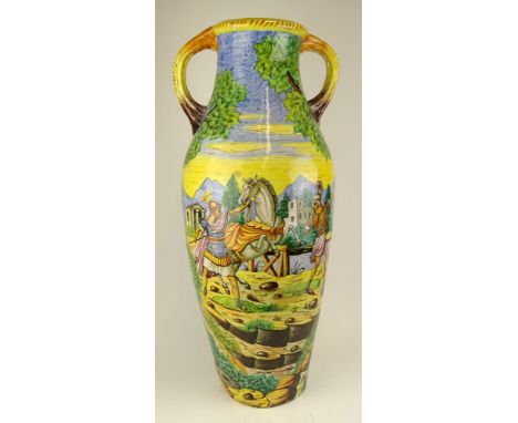 Large Vintage Italian Majolica Handled Urn. Figural motif. Unsigned. Minor chips at base. Measures: 32" H. Shipping: Third Pa