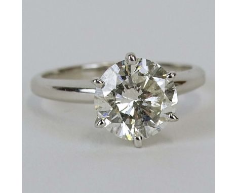 Lady's Tiffany style Approx. 2.27 Carat Round Cut Diamond and 14 karat White Gold Engagement Ring. Diamond J-K color, SI3-I1 
