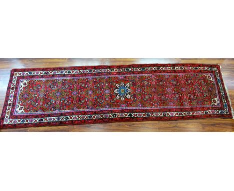 Vintage Afghan Rug Runner. Unsigned. Good condition. Measures 124 inches long, 34-1/2 inches wide. Shipping $85.00
