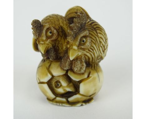 19th Century Japanese Carved Netsuke Depicting 2 Hens on a Hatching Egg. Signed with artist's signature Gyoku Shi (1801-1868)