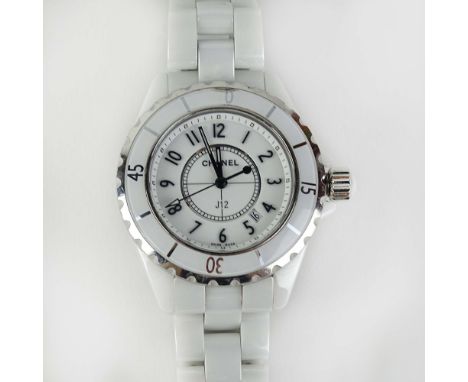 Chanel J12 Ceramic Swiss Quartz Movement Watch. Case measures 33mm. Small chip to bezel, minor surface scratches otherwise go