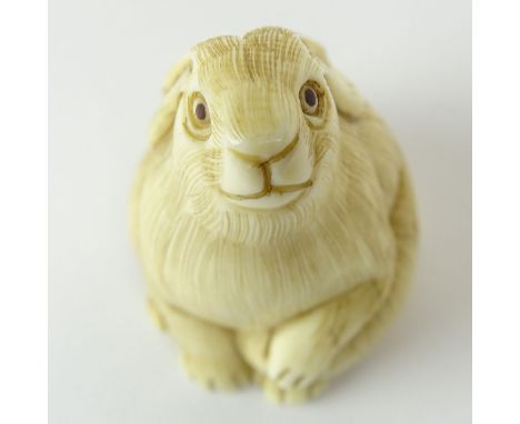 19/20th Century Japanese Carved Netsuke In The Form of a Seated Hare. Finely Incised. Signed with artist's signature on under